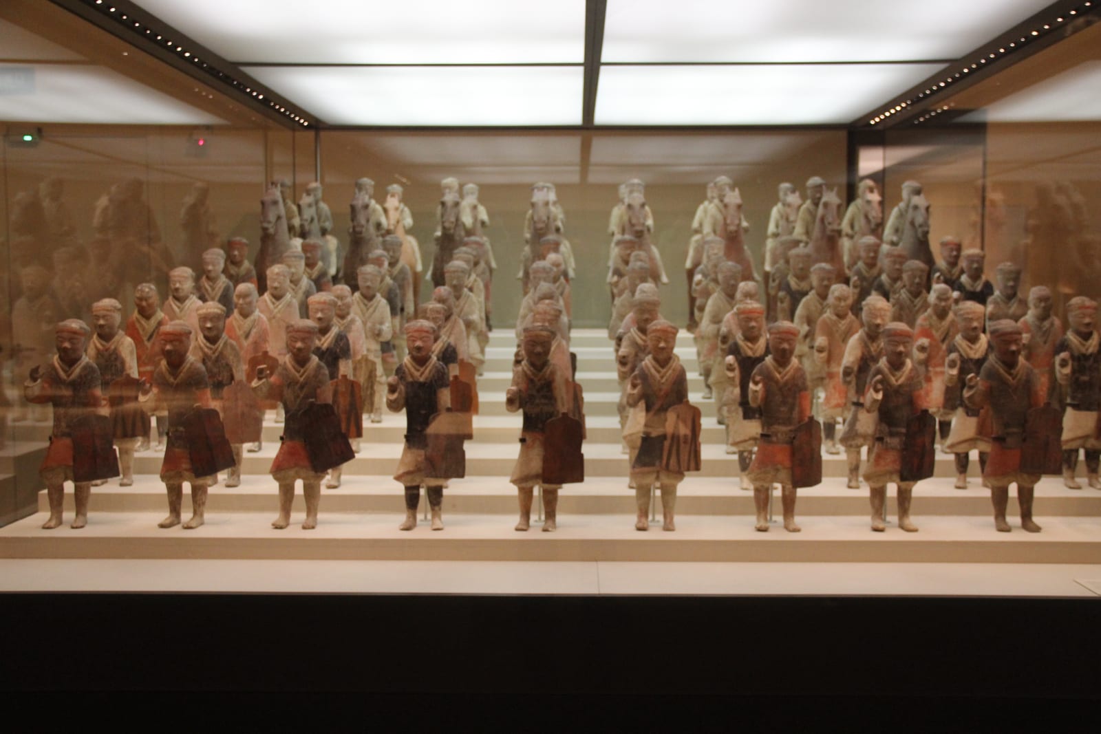 Rows of Western Han terracotta figures in a Xianyang museum display